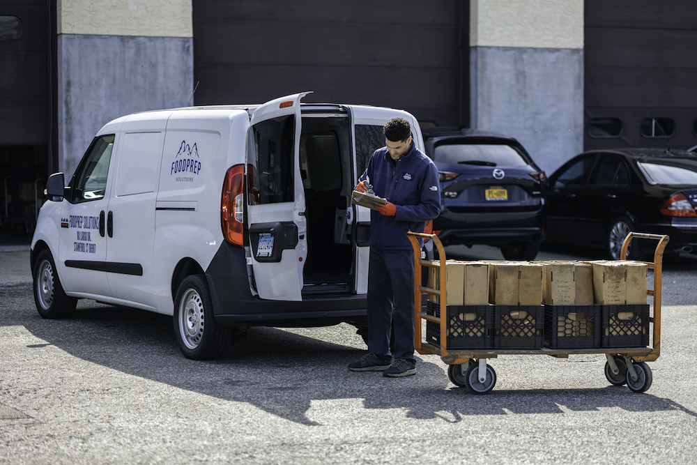 On location with a Food Prep delivery van.