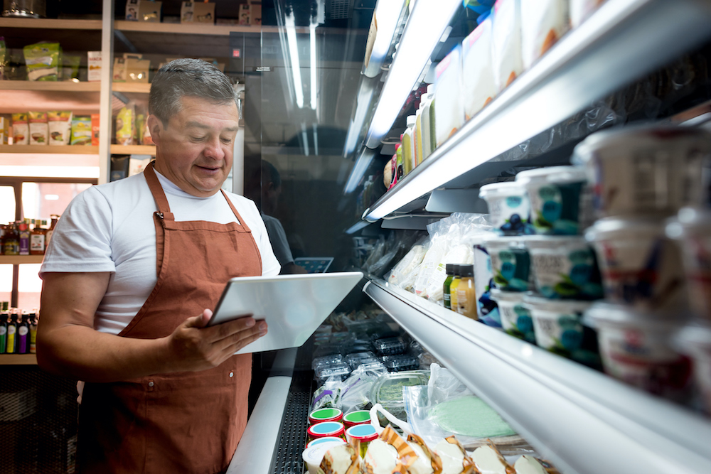 Man working at a grocery store