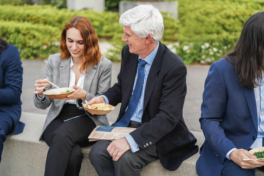 Business people eating outdoors